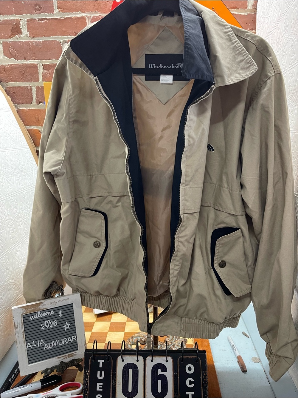vintage tan and black windbreaker jacket
